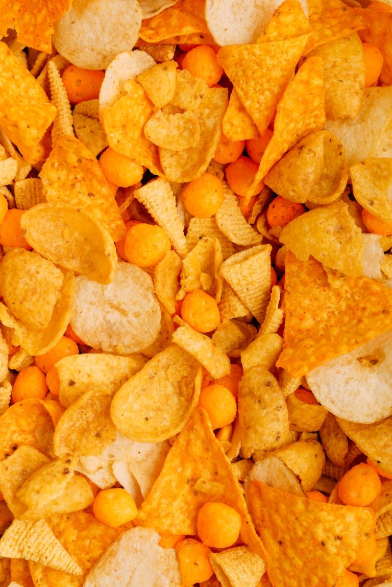 a close up of a pile of corn chips